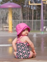 photo baby girl needing child support at water park