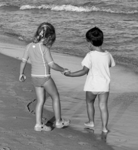 photo: brother and sister at beach needing retroactive child support