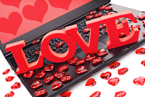 image: online dating love hearts on computer keyboard